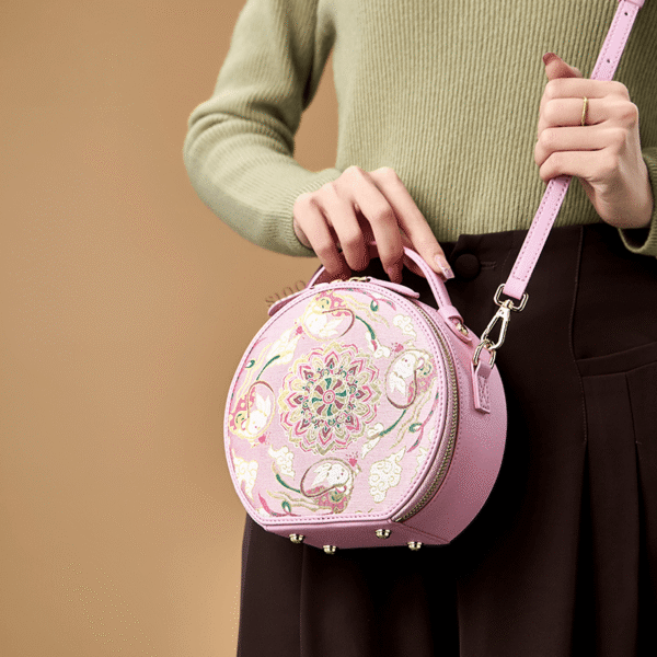 3_Song_Brocade_Pink_Retro_Round_Bag_Lotus_Lucky_Rabbit_Pattern_-_SinoCultural 3_Song_Brocade_Pink_Retro_Round_Bag_Lotus_Lucky_Rabbit_Pattern_-_SinoCultural