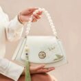 Embroidery_Leather_Vintage_White_Lotus_Handbag_with_Pendant_-_SinoCultural-2476538