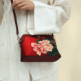 handmade-floral-embroidery-clutch-closeup