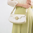 model-wearing-octagonal-brocade-bag-crossbody