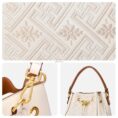 wanj-pattern-embroidered-leather-convertible-backpack-tote-detail-pattern-lock-strap
