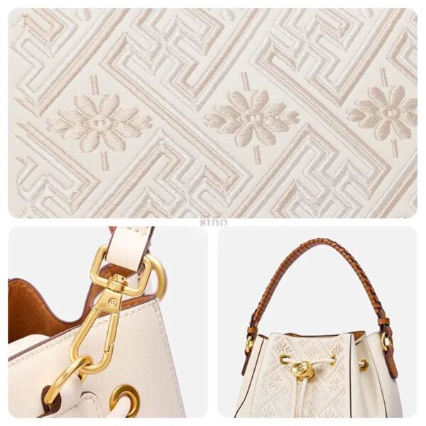 wanj-pattern-embroidered-leather-convertible-backpack-tote-detail-pattern-lock-strap wanj-pattern-embroidered-leather-convertible-backpack-tote-detail-pattern-lock-strap