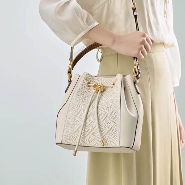 wanj-pattern-embroidered-leather-convertible-backpack-tote-model-shoulder-handheld wanj-pattern-embroidered-leather-convertible-backpack-tote-model-shoulder-handheld